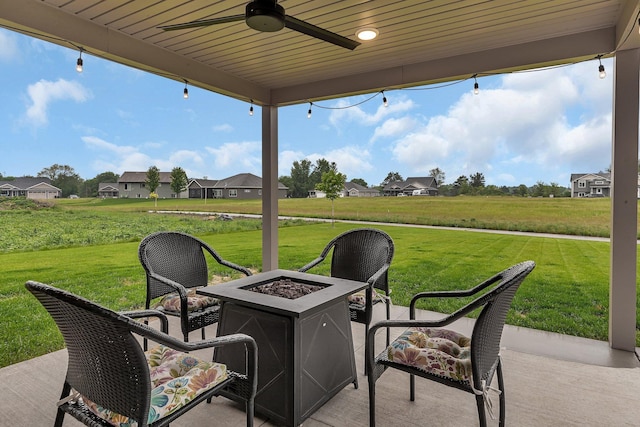 83 Meadow Ln, Cold Spring, MN 56320 - view of patio featuring a fire pit, ceiling fan, and a residential view