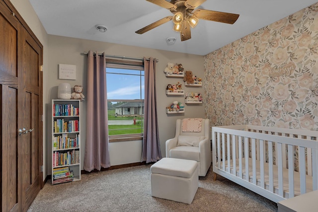 83 Meadow Ln, Cold Spring, MN 56320 - carpeted bedroom with a nursery area, baseboards, and a ceiling fan
