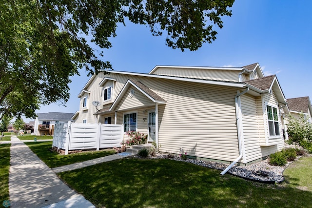 2383 58th Ave S Unit A, Fargo, ND 58104 - traditional-style house with a front lawn