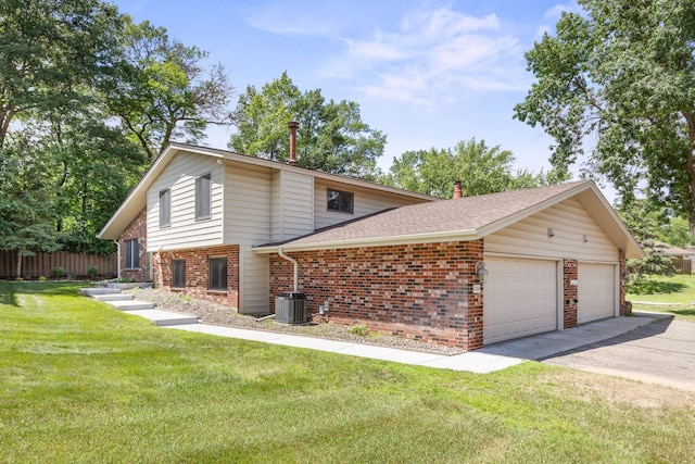 2304 Wildwood Trl, Minnetonka, MN 55305 - view of front of house with brick siding and roof with shingles