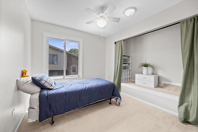 2304 Wildwood Trl, Minnetonka, MN 55305 - carpeted bedroom featuring baseboards and a ceiling fan