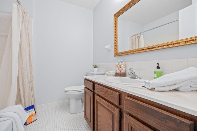 2304 Wildwood Trl, Minnetonka, MN 55305 - full bath featuring vanity, tile patterned flooring, a shower with curtain, and decorative backsplash