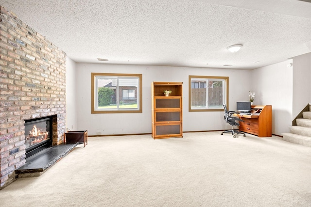2304 Wildwood Trl, Minnetonka, MN 55305 - office area featuring carpet floors, a fireplace, and a textured ceiling