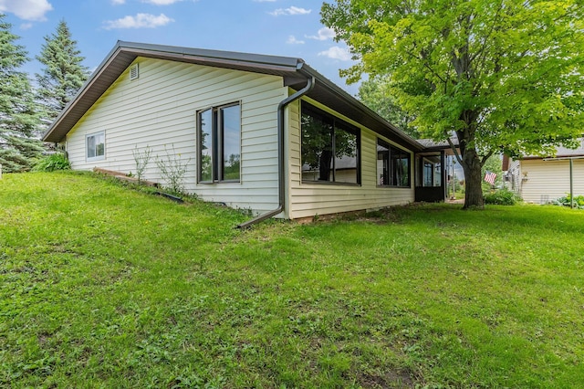 3864 Archie Dr SW, Alexandria, MN 56308 - view of home's exterior with a yard