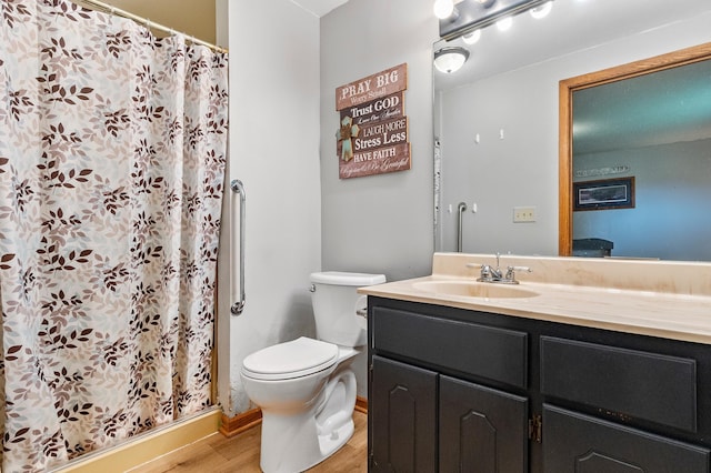 3864 Archie Dr SW, Alexandria, MN 56308 - full bathroom with vanity, wood finished floors, and a shower with shower curtain