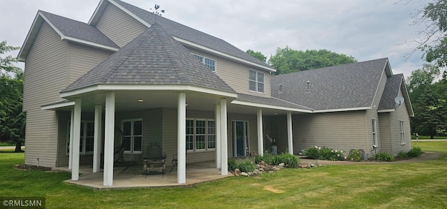 1470 Sims Rd NW, Oak Grove, MN 55011 - back of house with a lawn, a shingled roof, and a patio