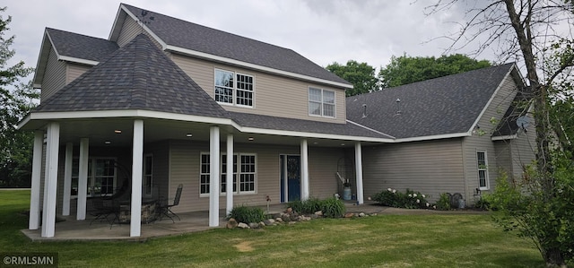 1470 Sims Rd NW, Oak Grove, MN 55011 - view of front of house featuring a front yard, roof with shingles, and a patio
