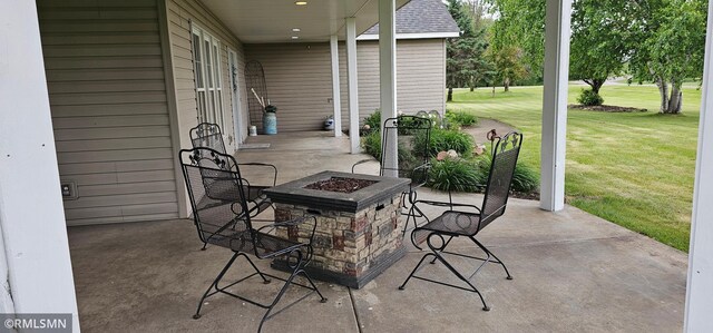 1470 Sims Rd NW, Oak Grove, MN 55011 - view of patio featuring an outdoor fire pit