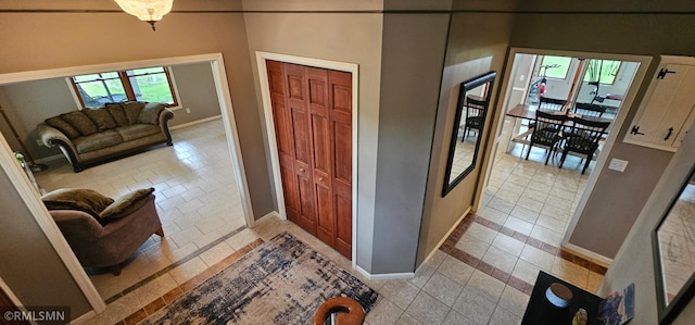 1470 Sims Rd NW, Oak Grove, MN 55011 - entrance foyer with baseboards and light tile patterned floors