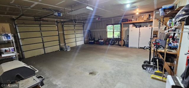 1470 Sims Rd NW, Oak Grove, MN 55011 - garage featuring a garage door opener