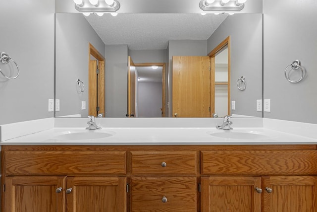 345 Roosevelt St S Unit C, Cambridge, MN 55008 - full bath with double vanity and a textured ceiling