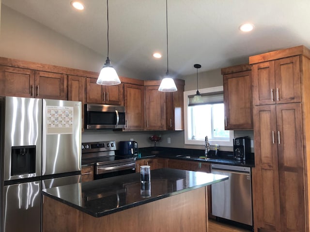 1009 188th St, Garfield Twp, WI 54009 - kitchen featuring stainless steel appliances, recessed lighting, a center island, hanging light fixtures, and dark stone counters