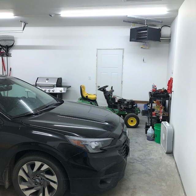 1009 188th St, Garfield Twp, WI 54009 - garage with a heating unit