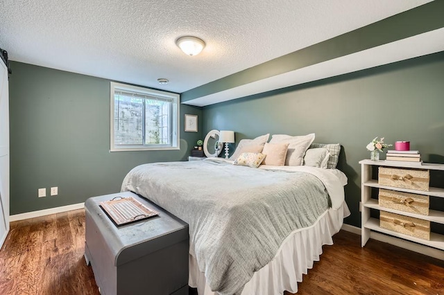 5112 Willow Ln, Minnetonka, MN 55345 - bedroom featuring dark wood-style floors and a textured ceiling