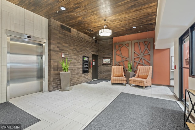 26 10th St W Unit 1409, Saint Paul, MN 55102 - lobby with wood ceiling and brick wall