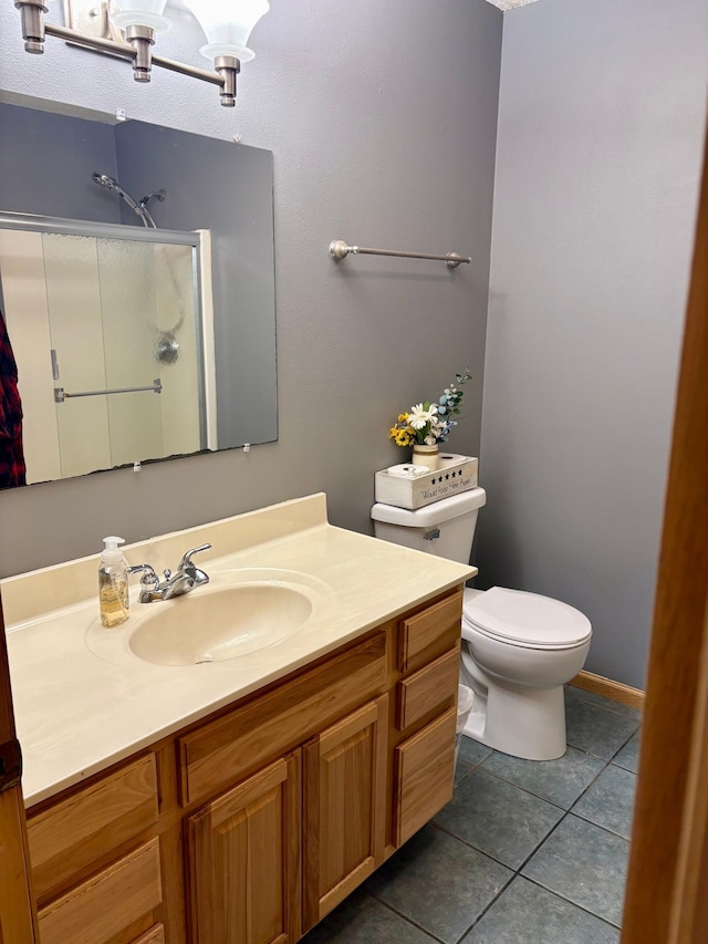 24080 Washington Dr, Osage, MN 56570 - bathroom featuring a shower, vanity, toilet, and tile patterned floors
