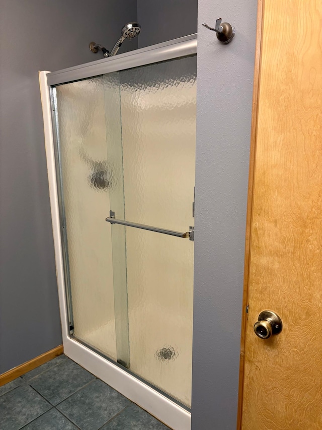 24080 Washington Dr, Osage, MN 56570 - full bathroom with tile patterned flooring and a shower stall