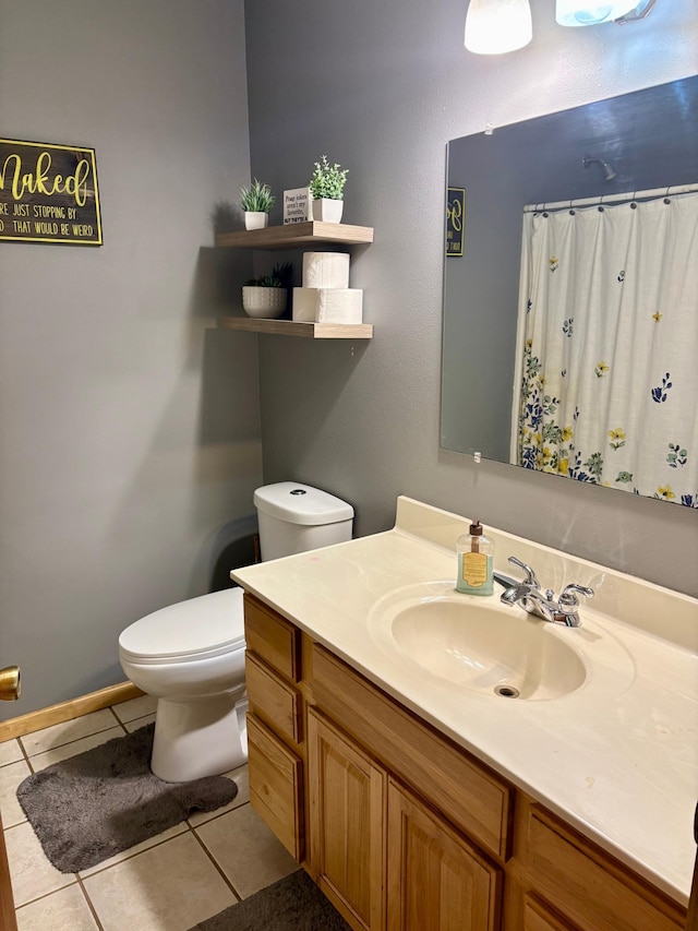 24080 Washington Dr, Osage, MN 56570 - bathroom with vanity, toilet, tile patterned floors, curtained shower, and baseboards