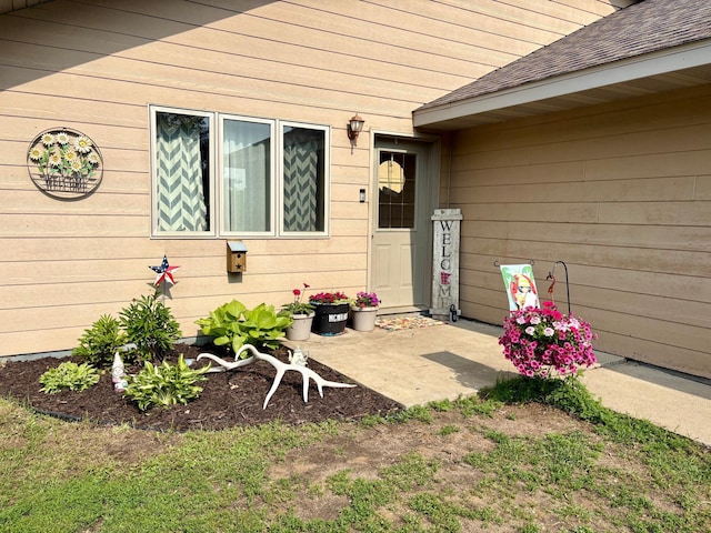 24080 Washington Dr, Osage, MN 56570 - property entrance with roof with shingles