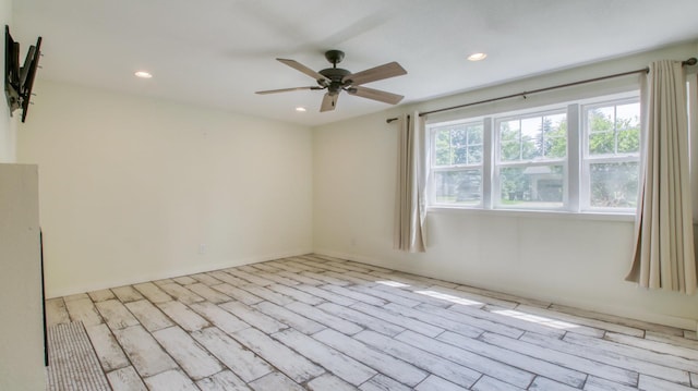 603 15th St SE, Menomonie, WI 54751 - empty room featuring a ceiling fan, recessed lighting, and wood finished floors