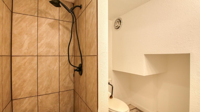 603 15th St SE, Menomonie, WI 54751 - bathroom view of tiled shower and toilet