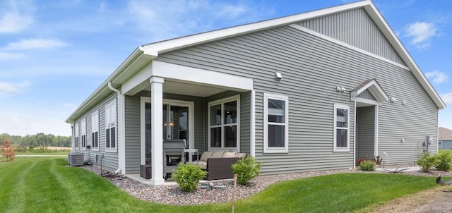 15730 Goodview Trl N, Hugo, MN 55038 - view of property exterior with a lawn, an outdoor living space, and a patio area