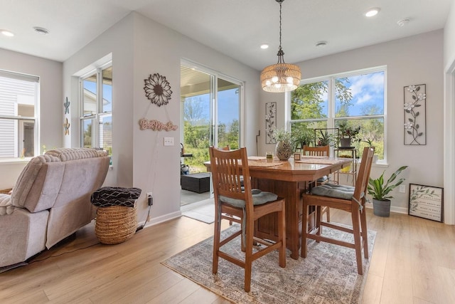 15730 Goodview Trl N, Hugo, MN 55038 - dining room with light wood finished floors, recessed lighting, and a chandelier