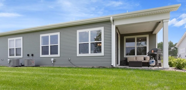 15730 Goodview Trl N, Hugo, MN 55038 - back of house with an outdoor living space and a yard