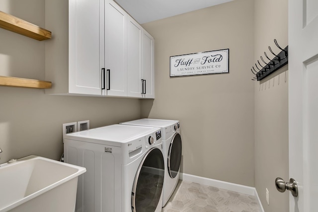 23974 185th St NW, Orrock Twp, MN 55309 - laundry area with separate washer and dryer and cabinet space
