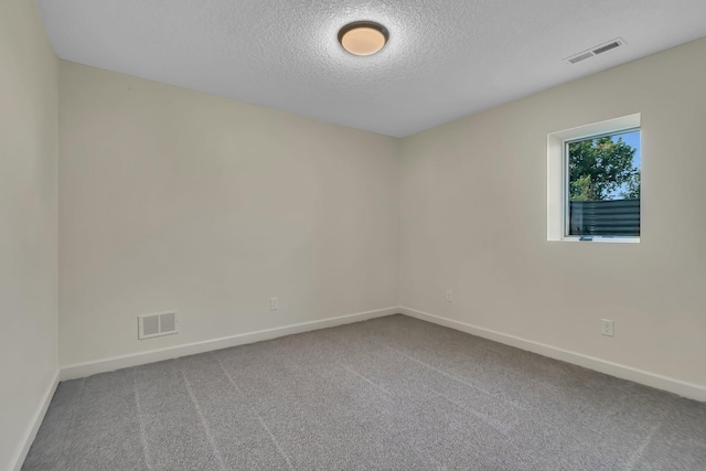 23974 185th St NW, Orrock Twp, MN 55309 - carpeted empty room with a textured ceiling and baseboards