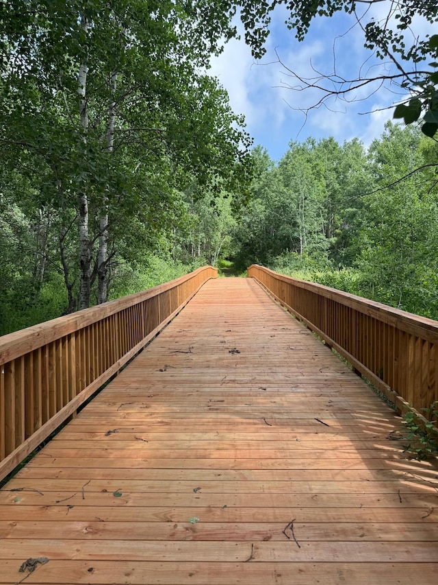 23974 185th St NW, Orrock Twp, MN 55309 - wooden terrace featuring a view of trees