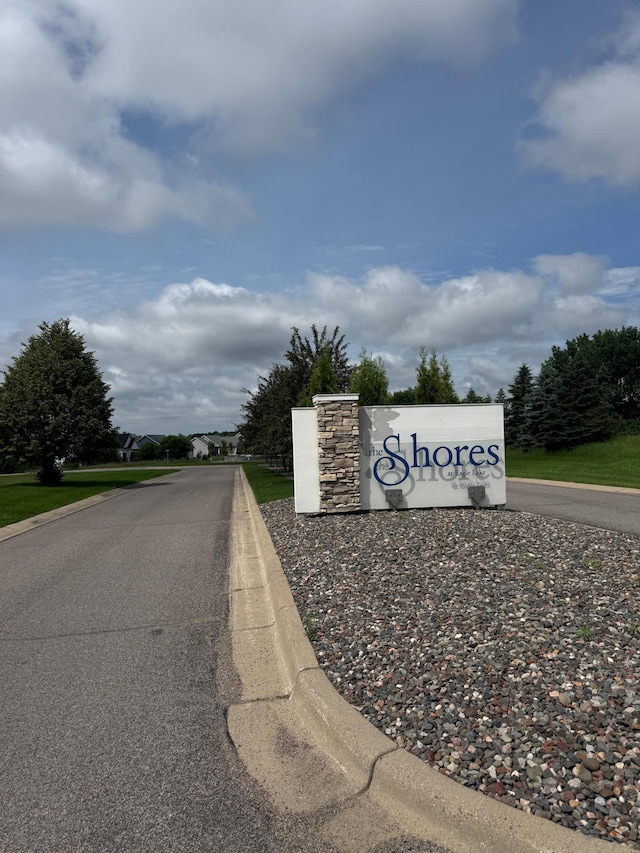 23974 185th St NW, Orrock Twp, MN 55309 - view of asphalt road featuring curbs