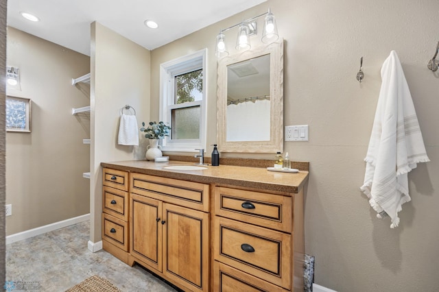 2702 2nd St N, Fargo, ND 58102 - full bath with vanity and baseboards