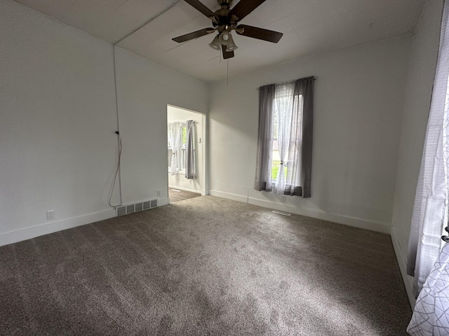 501 River St, Colfax, WI 54730 - unfurnished room featuring a ceiling fan, carpet, and baseboards