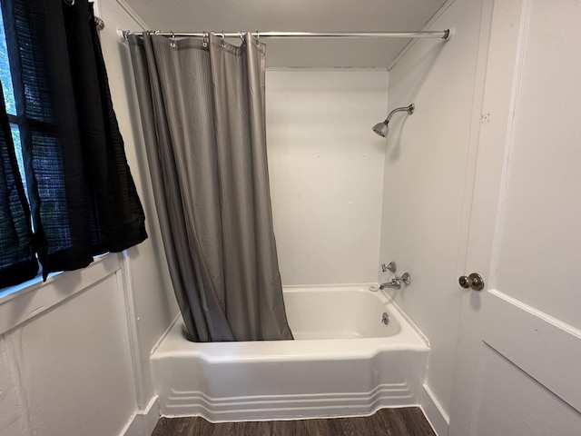 501 River St, Colfax, WI 54730 - full bathroom with wood finished floors and shower / tub combo
