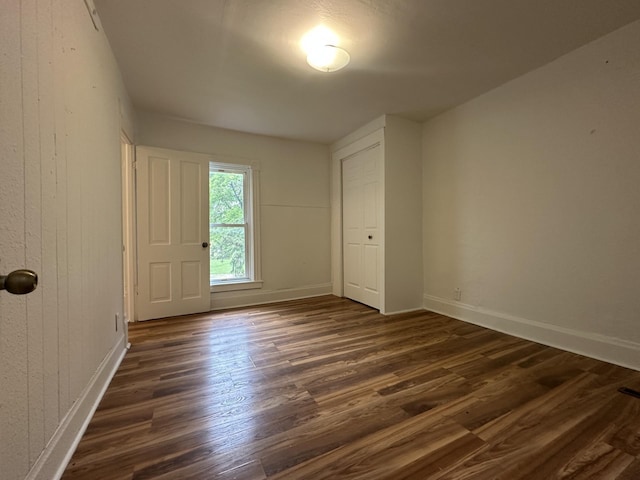 501 River St, Colfax, WI 54730 - unfurnished room featuring dark wood finished floors and baseboards