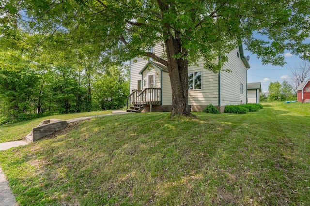 11 1st St, Nashwauk, MN 55769 - view of property exterior featuring a yard