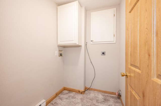 11 1st St, Nashwauk, MN 55769 - washroom with cabinet space, hookup for an electric dryer, washer hookup, a textured ceiling, and light carpet