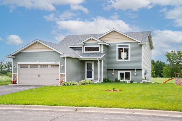 3322 Orchard Ave NE, Sauk Rapids, MN 56379 - view of front of property featuring a shingled roof, driveway, an attached garage, and a front yard