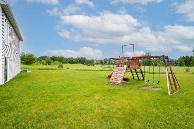 3322 Orchard Ave NE, Sauk Rapids, MN 56379 - view of green lawn with a playground