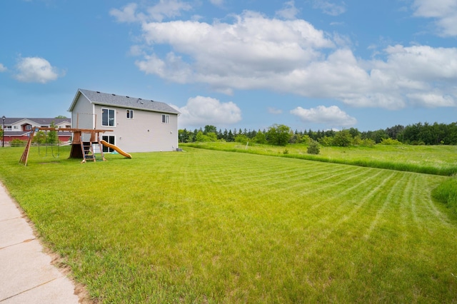 3322 Orchard Ave NE, Sauk Rapids, MN 56379 - view of grassy yard featuring a playground