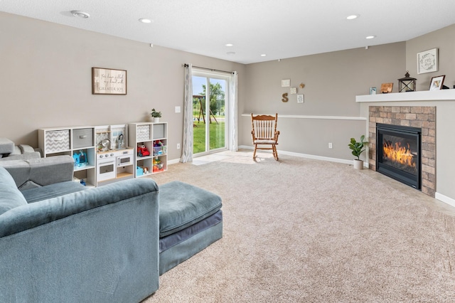 3322 Orchard Ave NE, Sauk Rapids, MN 56379 - carpeted living room with a fireplace and recessed lighting