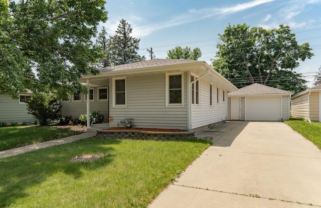 912 11 1/2 St SW, Rochester, MN 55902 - ranch-style home with an outdoor structure, a garage, and a front yard