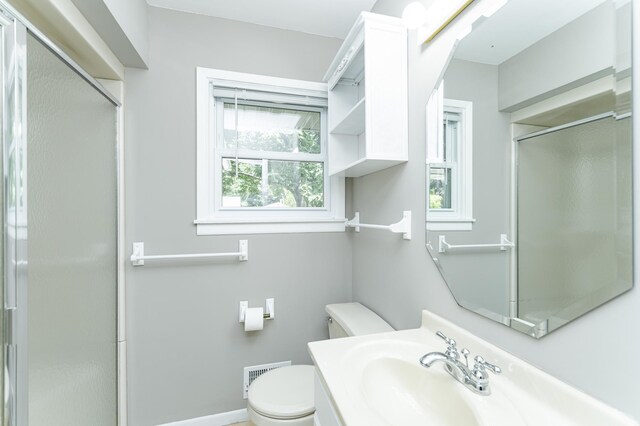 912 11 1/2 St SW, Rochester, MN 55902 - bathroom with a shower with door and vanity