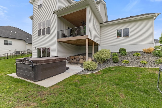 14960 143rd Ave N, Dayton, MN 55327 - back of house featuring a hot tub, a balcony, ceiling fan, and a patio