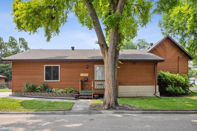 1301 5th Ave N, Moorhead, MN 56560 - chalet / cabin featuring a shingled roof