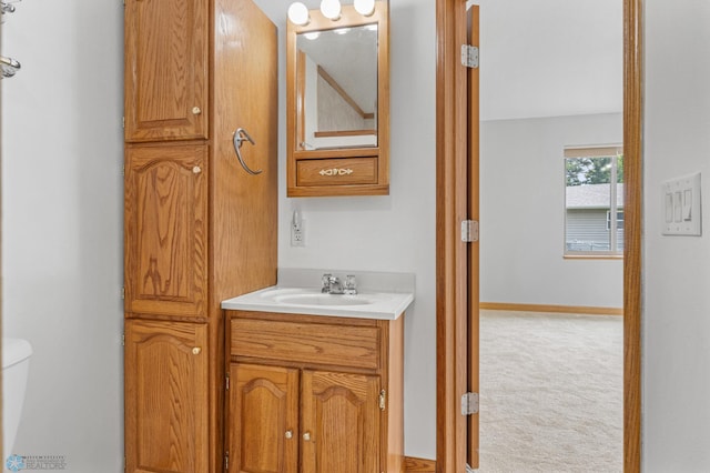 1301 5th Ave N, Moorhead, MN 56560 - half bathroom featuring toilet and vanity