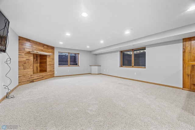 1301 5th Ave N, Moorhead, MN 56560 - finished below grade area featuring wood walls, carpet floors, and recessed lighting