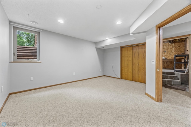 1301 5th Ave N, Moorhead, MN 56560 - unfurnished bedroom featuring carpet floors, a closet, and recessed lighting