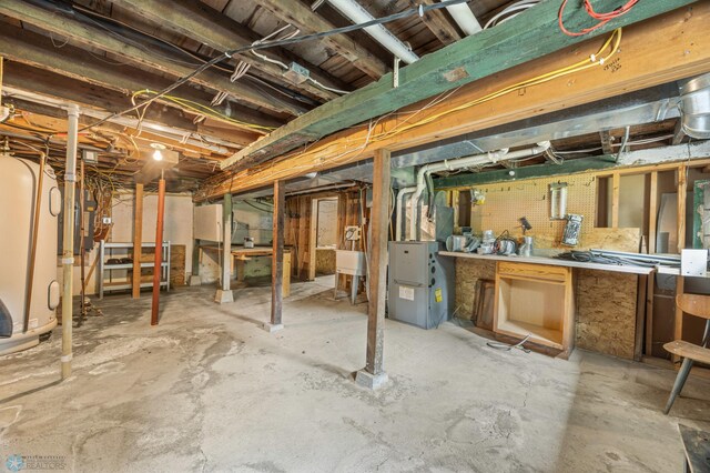 1301 5th Ave N, Moorhead, MN 56560 - unfinished basement with heating unit and a sink